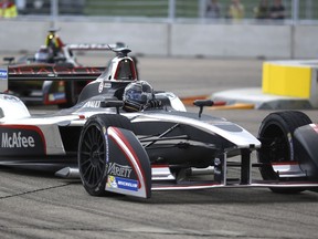 Second placed Jerome D'Ambrosio from Belgium of the Dragon Racing team drives his car during the Formula E Berlin ePrix auto race at the former airport Tempelhof, in Berlin, Germany, Saturday, May 23, 2015.