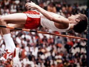 Canada's Greg Joy clears the high jump during 1976 Olympic finals in Montreal before 73,000 fans at the  Olympic Stadium.