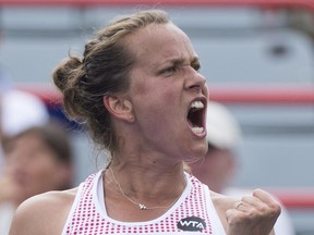 Barbora Strycova, of the Czech Republic, reacts during her round one match against Caroline Garcia, of France, at the Rogers Cup tennis tournament, in Montreal on Monday, July 25, 2016.