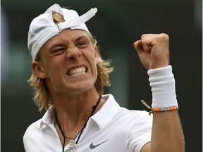 Canada's Denis Shapovalov reacts after winning a point against Australia's Alex de Minaur during boys' final at Wimbledon on July 10, 2016. Shapovalov won 4-6, 6-1, 6-3.