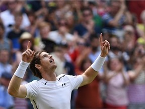 Britain's Andy Murray celebrates beating Czech Republic's Tomas Berdych in their men's singles semi-final match on the twelfth day of the 2016 Wimbledon Championships at The All England Lawn Tennis Club in Wimbledon, southwest London, on July 8, 2016.