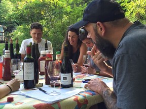 Which wines go best with ketchup? Participants in a blind taste test, from left: Stephen Kamp, Jane Rabinowicz, Édith Lapierre and Michel Beauchamp.