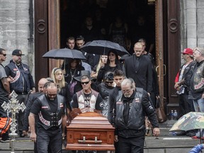In this file photo, motorcyclists leave the Alfred Dallaire Funeral Home in Repentigny on Saturday, November 7, 2015. as hundreds of members of several motorcycle clubs from across Canada gather for the funeral of 63-year-old Lionel Deschamps, a member of Hells Angels Montreal chapter. On Saturday, Aug. 13, 2016, members of the Hells Angels will attend a funeral for Kenny Bédard, killed in a road accident in New Brunswick.