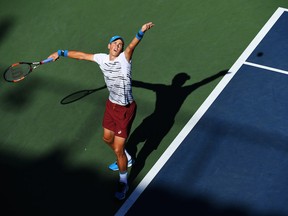 Vasek Pospisil of Canada serves to Jozef Kovalik of Slovokia during his first round Men's Singles match on Day One of the 2016 U.S. Open at the USTA Billie Jean King National Tennis Center on Aug. 29, 2016. in the Flushing neighbourhood of the Queens borough of New York City.