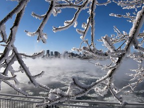 Ice fog from the St. Lawrence river blankets Montreal as wind chill temperatures hit -38 C Wednesday.

(Ice fog from the St. Lawrence river blankets the city as windchill temperatures hit -38C Wednesday, January 23, 2013 in Montreal.THE CANADIAN PRESS/Ryan Remiorz ORG XMIT: RYR101)