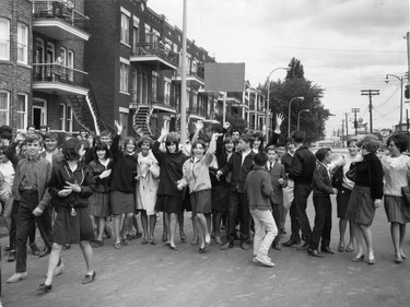 1965: Secondary school students march through the streets of Verdun to show sympathy with their professors in a teacher-school commission dispute. These girls look so fashionable, with their 60s bobs, just-above the knee skirts and sensible heels. All that's missing is the Beatles.