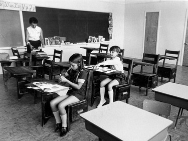1973: Harrington Elementary School teacher Edith McCallum only has two pupils, whose dresses don't go anywhere near their knees.