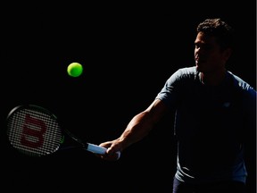 Milos Raonic hits a shot during a practice session prior to the start of the 2016 US Open at the USTA Billie Jean King National Tennis Center on August 26, 2016, in the Queens borough of New York City.