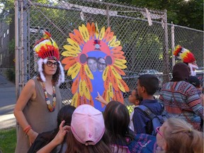 A teacher at École Lajoie wears an indigenous headdress costume on Aug. 29, 2016. Photo by Jennifer Dorner