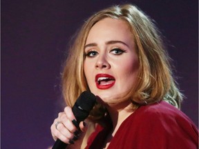 This Feb. 24, 2016 file photo shows Adele onstage at the Brit Awards 2016 at the 02 Arena in London. Adele's personal wealth is said to be around £85million ($146 million) yet there she was trying to “grab some bargain buys" at H&M recently.
