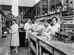 B. Moore was the Montreal General Hospital's first trained pharmacist and first chief pharmacist. He is pictured with staff circa 1920.