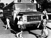 1983: A school bus parks diagonally to prevent cars from passing illegally. This was taken the last week of school, so it was probably 'anything goes' in the fashion dept.