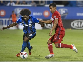 Chicago Fire's Brandon Vincent, right, battles with Montreal Impact's Michael Salazar during second half MLS action in Montreal on Saturday, August 20, 2016.