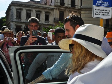 Singer Madonna gets in a car in Havana, where she was celebrating her 58th birthday, on Tuesday, Aug. 16, 2016.