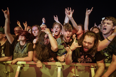 Music fans scream during the performance by the American metal band Disturbed on day two of the Heavy Montreal music festival at Jean-Drapeau Park in Montreal on Sunday, August 7, 2016.