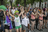 A crowd cheers as they watch the Montreal Pride Parade through Rene-Levesque boulevard in downtown Montreal on Sunday, August 14, 2016.