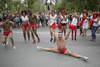 A man does the splits as people take part in the Montreal Pride Parade through Rene-Levesque boulevard in downtown Montreal on Sunday, August 14, 2016.