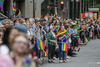 A crowd watches the Montreal Pride Parade through Rene-Levesque boulevard in downtown Montreal on Sunday, August 14, 2016.