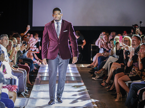 Nashville Predators defenceman P. K. Subban models one of his suits that he created in collaboration with retailer RW & CO during a fashion show at the launch of the their 2016 collection in Montreal on Tuesday, August 16, 2016.