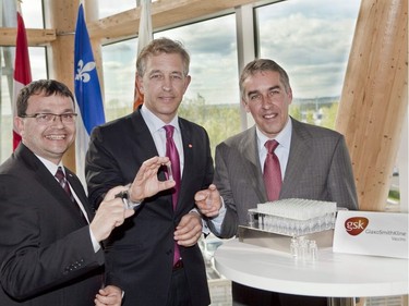 UQAM grad and GlaxoSmithKline Canada's President Paul Lirette  displays vaccine vials at the company's Sainte-Foy facility in 2013. Lirette was joined by Jacques Gourde (left), the MP for Lotbinière—Chutes-de-la-Chaudière, and Nicolas Marceau (right), Quebec's minister of finance and the economy.