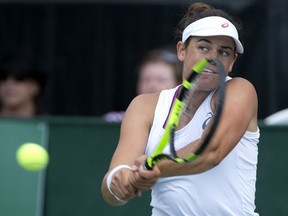 Jennifer Brady of the U.S.  hits a return to Olga Govortsova of Belarus during the final of the Banque Nationale tournament in Granby, August 7, 2016.