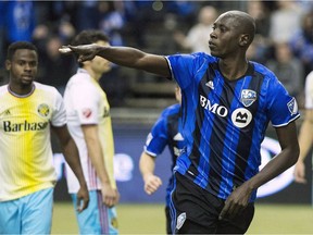 Montreal Impact's Hassoun Camara celebrates after scoring against the Columbus Crew SC during second half MLS soccer action in Montreal, Saturday, April 9, 2016. Despite constant turnover of players, goalkeeper Evan Bush and defender Hassoun Camara keep rolling along with the Montreal Impact.