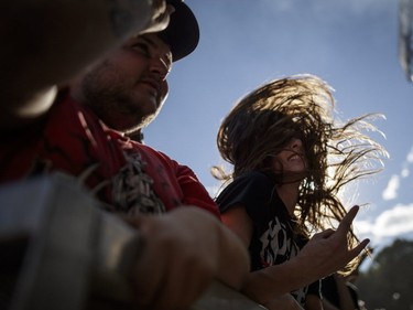 Music fans watch the performance by Swedish band Sabaton on Day One of the Heavy Montréal music festival at Jean-Drapeau Park in Montreal on Saturday, August 6, 2016.