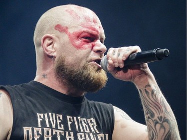 MONTREAL, QUE.: AUGUST 6, 2016 -- Ivan Moody of the American heavy metal band Five Finger Death Punch performs on day one of the Heavy Montreal music festival at Jean-Drapeau Park in Montreal on Saturday, August 6, 2016. (Dario Ayala / Montreal Gazette) ORG XMIT: 56824