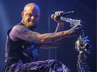 Ivan Moody of the American heavy metal band Five Finger Death Punch performs on Day One of the Heavy Montréal music festival at Jean-Drapeau Park in Montreal on Saturday, August 6, 2016.