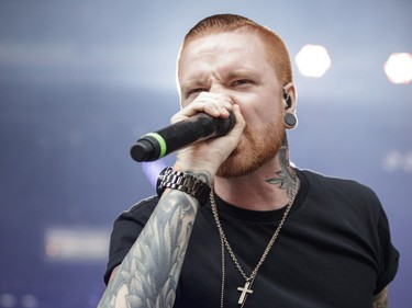Matty Mullins of the American metalcore band Memphis May Fire performs on Day Two of the Heavy Montréal music festival at Jean-Drapeau Park in Montreal on Sunday, August 7, 2016.