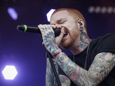 Matty Mullins of the American metalcore band Memphis May Fire performs on Day Two of the Heavy Montréal music festival at Jean-Drapeau Park in Montreal on Sunday, August 7, 2016.