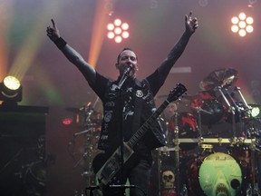 Michael Poulsen of the Danish metal band Volbeat performs on Day Two of the Heavy Montréal music festival at Jean-Drapeau Park in Montreal on Sunday, August 7, 2016.