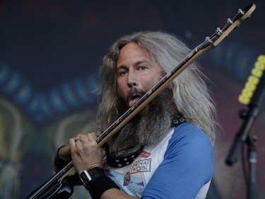 Troy Sanders of the American heavy metal band Mastodon performs on Day One of the Heavy Montréal music festival at Jean-Drapeau Park in Montreal on Saturday, August 6, 2016.
