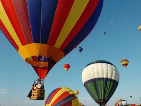 Hot air balloons fill the sky at the annual International Montgolfières balloon festival in St-Jean-sur-Richelieu, Quebec, south of Montreal Saturday Aug. 11, 2007.  Approximately 115 balloons took off simultaneously from Fort St-Jean.