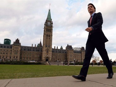 Prime Minister Justin Trudeau makes his way from Parliament Hill to the National Press Theatre in Ottawa.