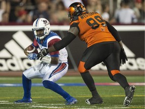 "We take one step forward, two steps back ... two steps forward, four steps back," quarterback Kevin Glenn, getting sacked by B.C. Lions' Jabar Westerman on Aug. 4 at Molson Stadium, says of Alouettes' season.