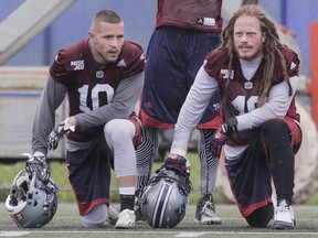 LENNOXVILLE, QUE.: MAY 29, 2016 -- Safety Marc-Olivier Brouillette, left, and linebacker Bear Woods, right, take part in the Montreal Alouettes training camp at Bishop's University in Lennoxville on Sunday, May 29, 2016. (Dario Ayala / Montreal Gazette) ORG XMIT: 56290