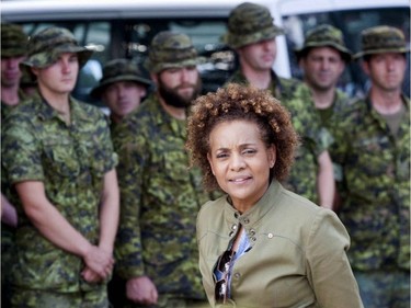 Former Governor-General of Canada  Michaëlle Jean speaks with Canadian troops in her native Haiti in 2010.
