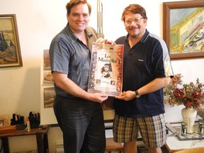 Frayne McCarthy, left, and Kevin John Saylor ran into roadblocks in their mission to restore a theatre in the Ontario town of Gananoque. Some of McCarthy's old friends from the 1991 Montreal cast of Les Misérables have come to the rescue, preparing a performance of songs from the musical to raise funds.