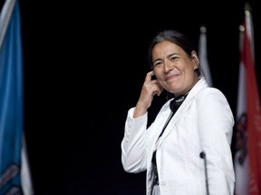 Native leader Michele Audette, of Mani Utenam, Que., smiles at the Assembly of First Nations Annual General Assembly in Toronto on July 19, 2012. Audette, president of the Native Women's Association, has written an emotional letter to the prime minister, pleading with him to do what it takes to end Attawapiskat Chief Theresa Spence's five-week-long hunger protest.