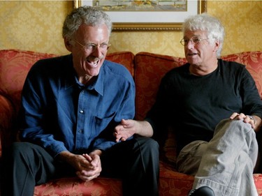 Producer Jake Eberts (left) laughs at story being told by director Jean-Jacques Annaud about making their new film Two Brothers, during an interview in 2004.