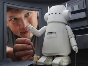 Kid Koala says the stage version of Nufonia Must Fall, adapted from his graphic novel of the same name, came together organically despite all its moving parts. "It almost seemed like the universe was saying, 'This is clearly what you need to be doing,’ “ recalls the Montrealer, pictured with one of the show’s puppets in his home studio.