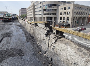 Cracked concrete, warped metal and broken windows from a nearby office building are some of the damage from the fatal truck crash and fire that took place on Highway 40 on Aug. 9, 2016 in Montreal.