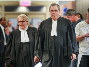 Defence lawyer Alan Guttman walks out of the courtroom  during a break in closing arguments at the Richard Henry Bain trial in Montreal Friday August 12, 2016.