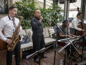 Colin Hunter, second from left, founder and owner of the Sunwing Travel Group, performs with his Jazz group at the Maison Boulud restaurant in the Ritz-Carlton Hotel in Montreal on Sunday, August 14, 2016.
