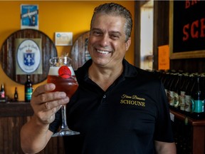 Patrice Schoune enjoys one of his beers at his micro brewery, Ferme Brasserie Schoune in St-Polycarpe. (Dave Sidaway, Montreal Gazette)