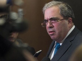 Richard Henry Bain's lawyer Alan Guttman, speaks to reporters after the verdict was delivered in Montreal on Tuesday, Aug. 23, 2016.