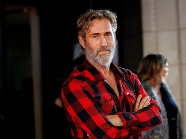 Roy Dupuis, who plays Narcisse, poses on the red carpet outside the Imperial Cinema Thursday, Aug. 25, 2016 for the première of Quebec director André Forcier's Embrasse-moi comme tu m'aimes, the opening film of the Festival des films du monde.