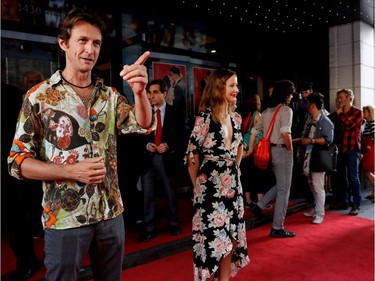 Stéphane Crête, who plays M. Rivest, and Juliette Gosselin, who plays Berthe Sauvageau, pose on the red carpet outside the Imperial Cinema Thursday, Aug. 25, 2016 for the première of Quebec director André Forcier's Embrasse-moi comme tu m'aimes, the opening film of the Festival des films du monde.