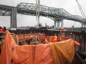 A crew at the new Champlain Bridge work site on Thursday, August 25, 2016.